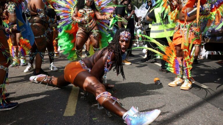 Notting Hill Carnival celebrates Windrush legacy in blaze of colour