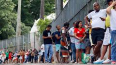 Voters in Brazil head to polls as Lula goes up against Bolsonaro’s son