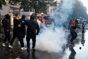 Albanian police fire tear gas at protesters as Education Ministry attacked